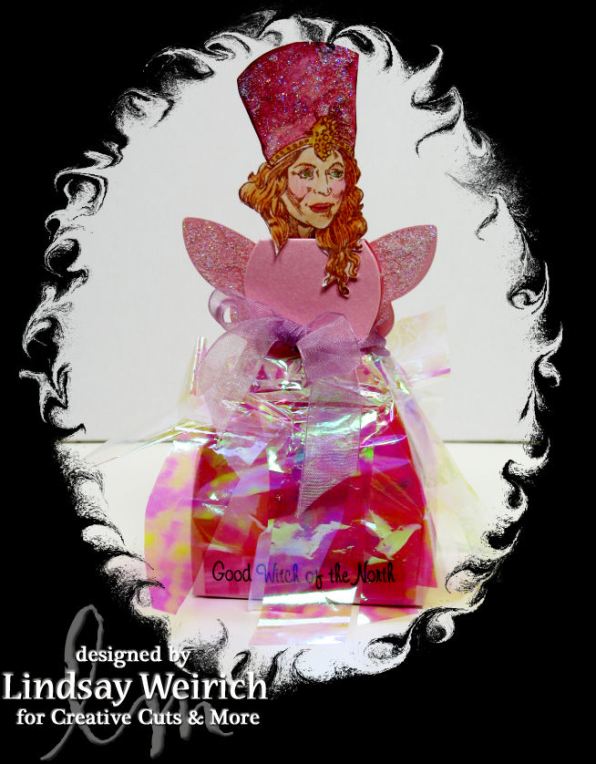 Are you a good witch, or a bad witch? Glenda is my favorite! I used the Angel diecut and trhe dress box cut from pearly pink cardstock to make her! Did you know the actress who playes Glenda was 51 when she played the part, I'll have whatever she's having!