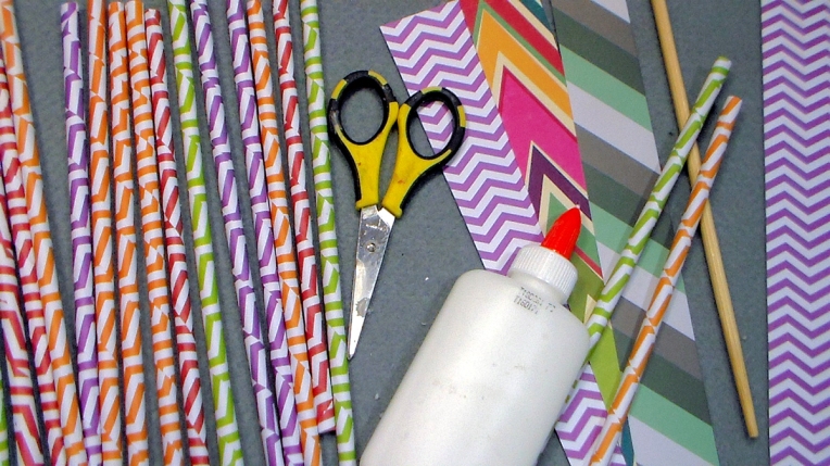 Supplies: Scrapbook paper, school glue, a chopstick, scissors and wax.